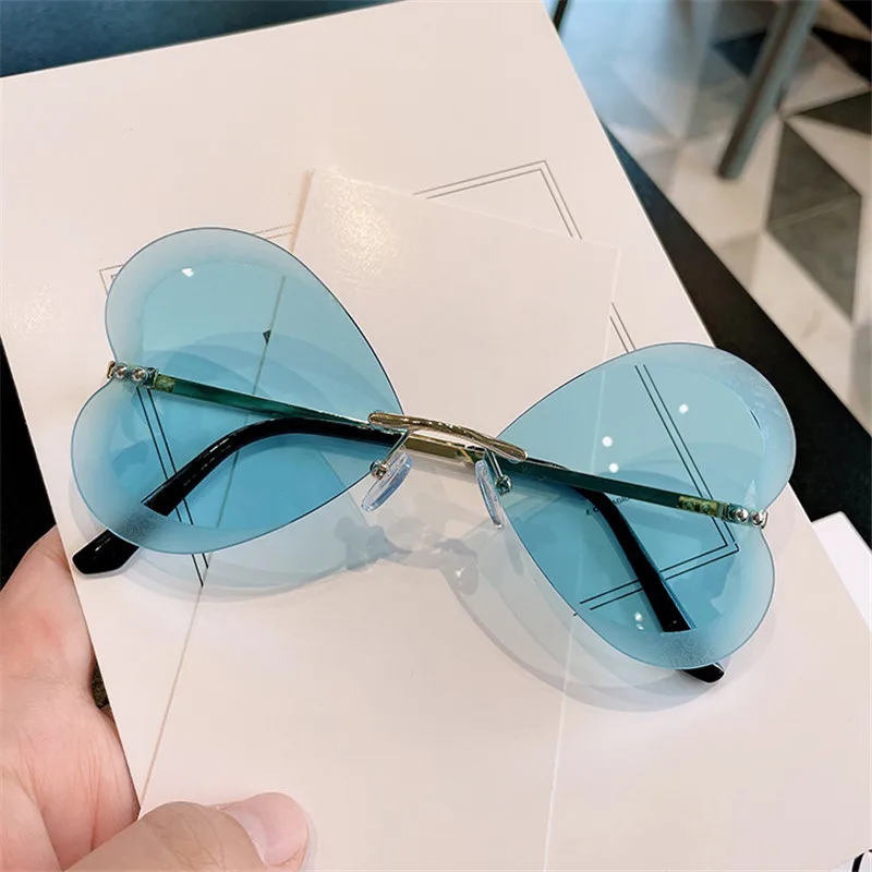 

Unique Rimless Heart Eyewear Female Sunglasses Frameless Sun Glasses Ladies Eyepiece Women Sunshade Butterfly Eyeglasses Oculos