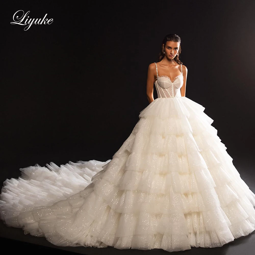 

Роскошное блестящее кружевное бальное платье Liyuke, свадебное платье на бретелях-спагетти, платье с вырезом сердечком из иллюзии, платье с ка...