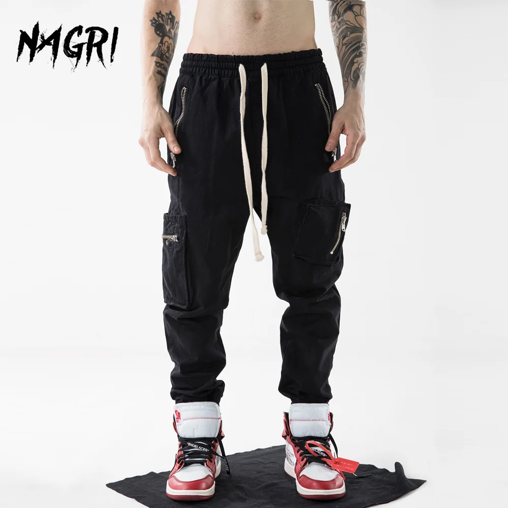 

Джоггеры мужские в стиле хип-хоп, шаровары с несколькими карманами, на металлической молнии, брюки-карго, уличная одежда, повседневные спорт...