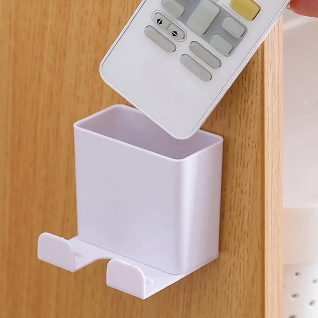 

1 pcs Phone Wall Holder Smartphone Hanging Wall Storage Rack Mounted Mobile Phone Wall Holder Charging Holder Remote Control