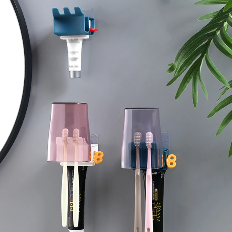

2 Pieces Rolling Tube Toothpaste Squeezer Tooth-Brushing Cup Seat Holder Stand Rotate Toothpaste Dispenser for Bathroom