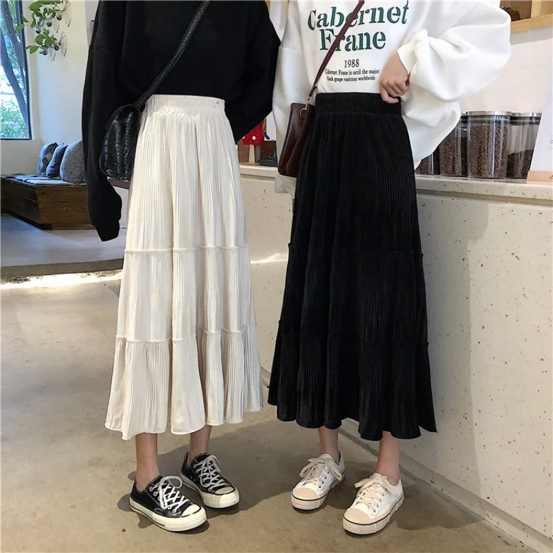 

Женская плиссированная юбка средней длины, с завышенной талией