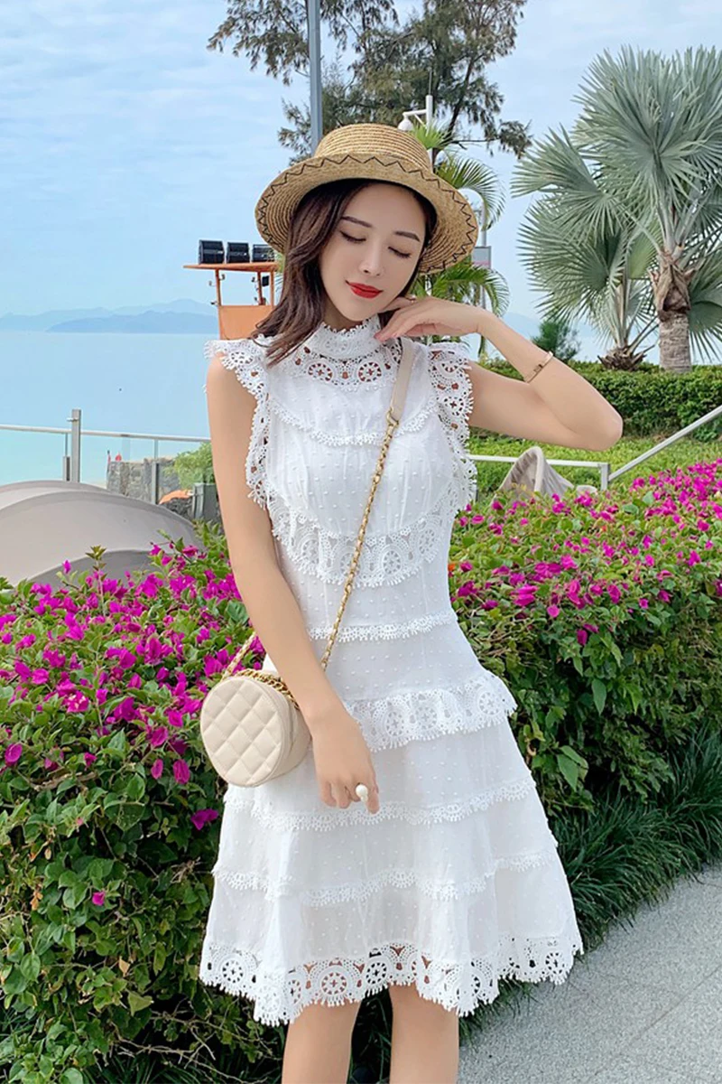 

2020 New Summer Flting Sleeve White Dress Women's Summer Elegant Dress Female Ins Slimming Hollow Our Dress