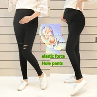 spring and autumn new maternity pants pregnant women wash water denim hole pants stretch stomach lift pants feet pants