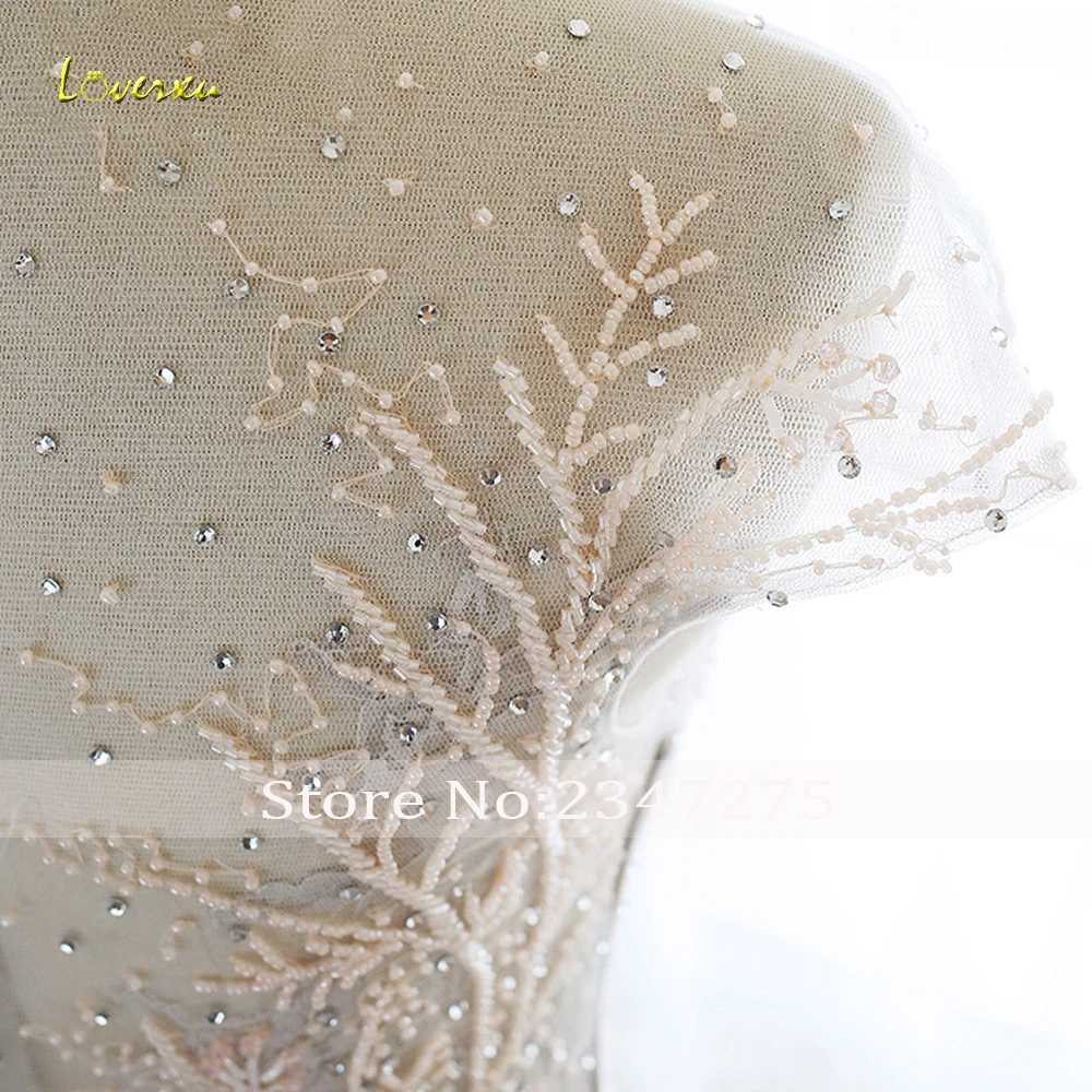 

Loverxu Sexy Illusios Ruffles Tiered A Line Wedding Dresses 2019 Cap Sleeve Applique Beaded Court Train Vintage Bridal Gowns