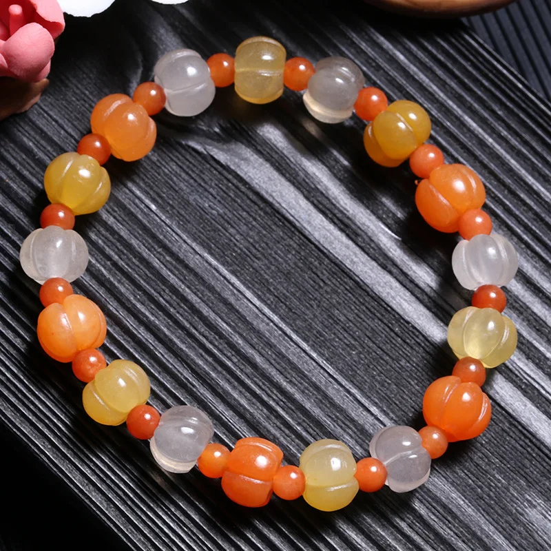 

Natural Xinjiang Wuerhe genuine gold silk jade gem light pumpkin bracelet for men and women