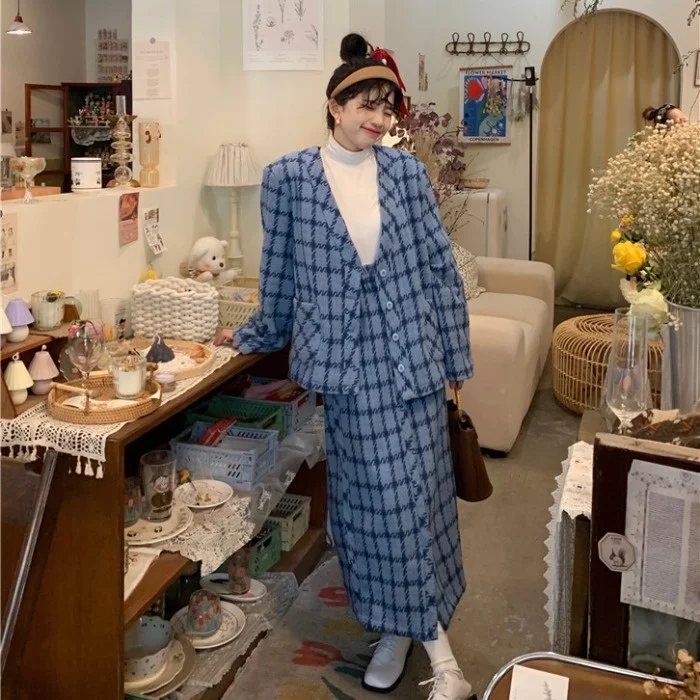 Женский шерстяной костюм в клетку комплект из двух предметов с юбкой и высокой