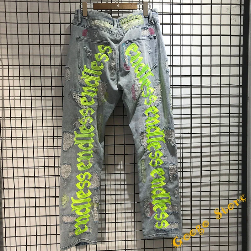 

Black Fluorescent Green Letter Embroidery Denim Pants Men Women Hip Hop Damage hole Distressed Jeans High Quality Denim Jean