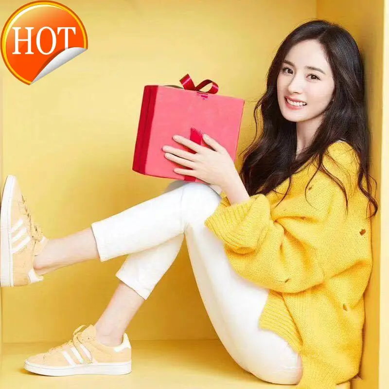 

2021 autumn new celebrities with the same paragraph Yang Mi yellow ripped sweater women's jacket western style loose and lazy