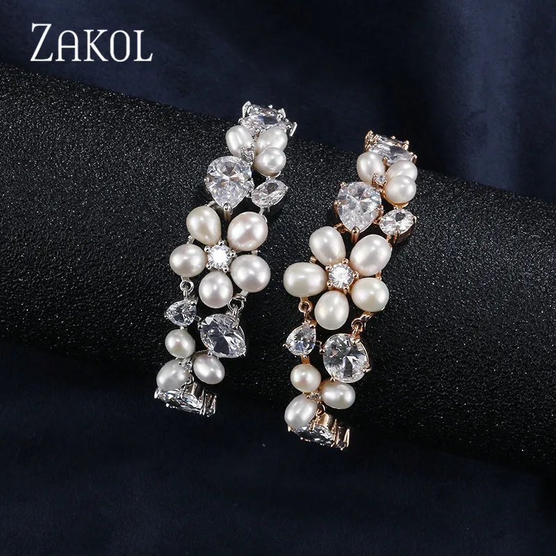 Женский браслет ZAKOL Круглый с имитацией жемчуга и фианитом элегантные вечерние