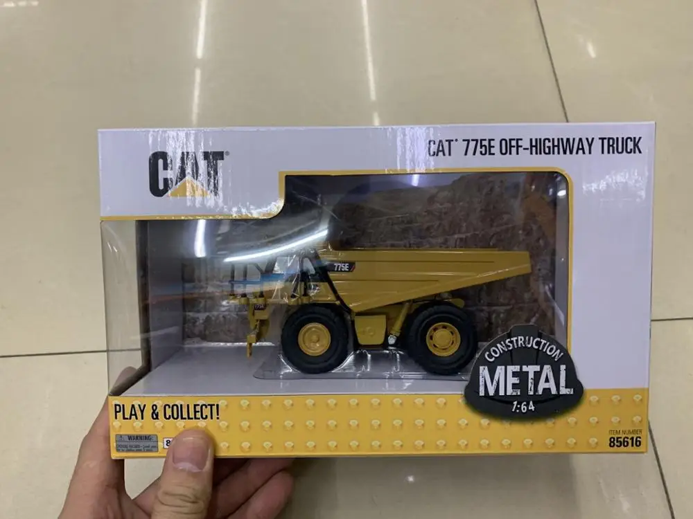 

Внедорожный грузовик Caterpillar Cat 775E 1/64, металлический брикет DM85616