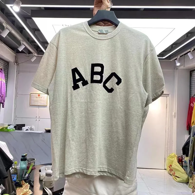 

Trendy lettering, ABCFLOCKED, loose-fitting men’s short-sleeved T-shirt