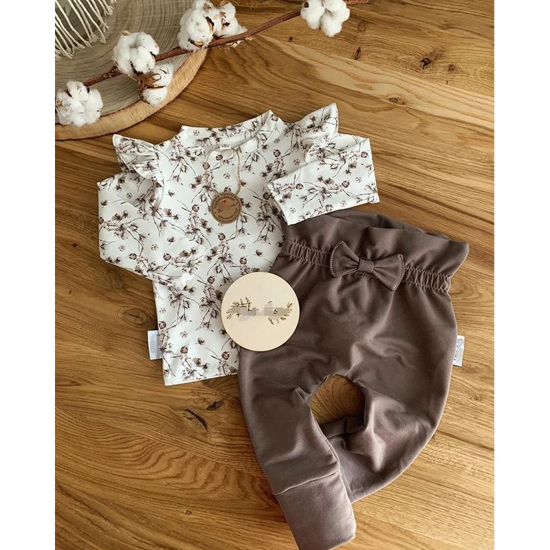 

Toddler Baby Girl Pant Suit Flower Print Ruffle Decoration Long-Sleeved Round Collar T-Shirt+Solid Color Trouser