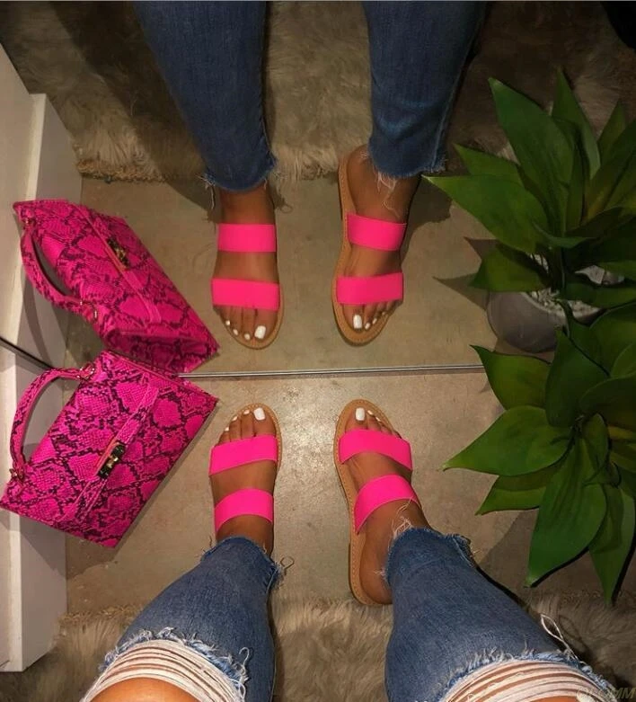 Factory direct sales slippers new women's beach shoes PVC candy color sandals flat bottom ladies outdoor travel slippers