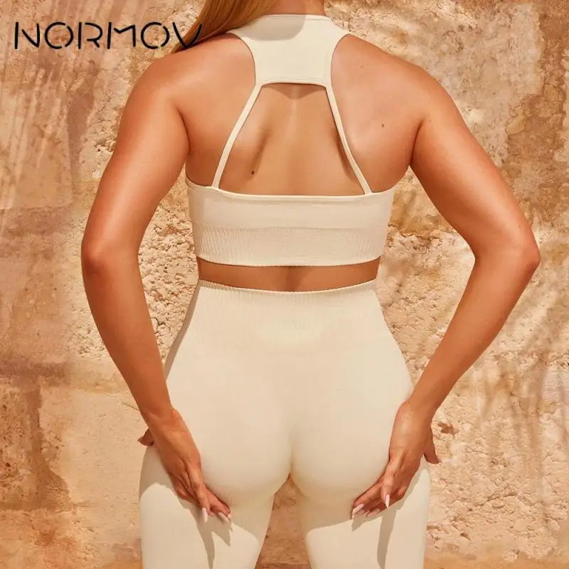 

Комплект Спортивный NORMOV бесшовный из 2 предметов, комплект для тренировок, однотонный бюстгальтер пуш-ап и комплект для йоги с завышенной та...