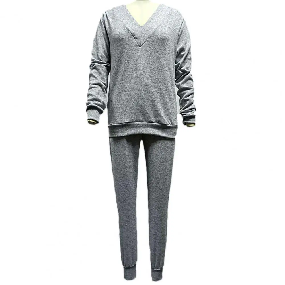 

Женский спортивный костюм с V-образным вырезом и длинным рукавом