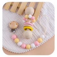 xcqgh 2pcsset baby teether toy wooden rattle and pacifier clips food grade bracelet rattle teether music diy baby product