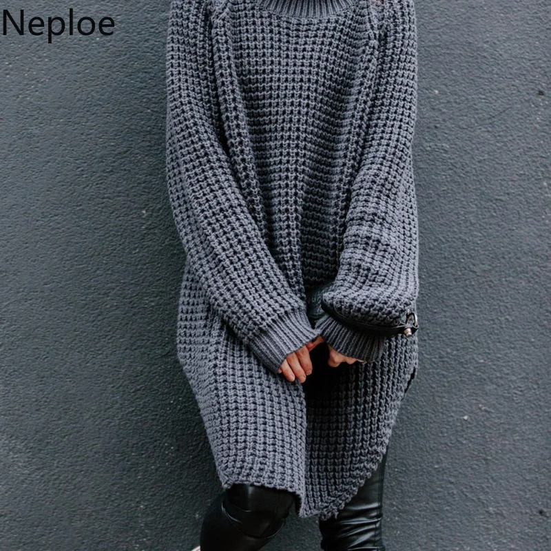 Женский плотный вязаный пуловер с высоким воротником и разрезом сбоку