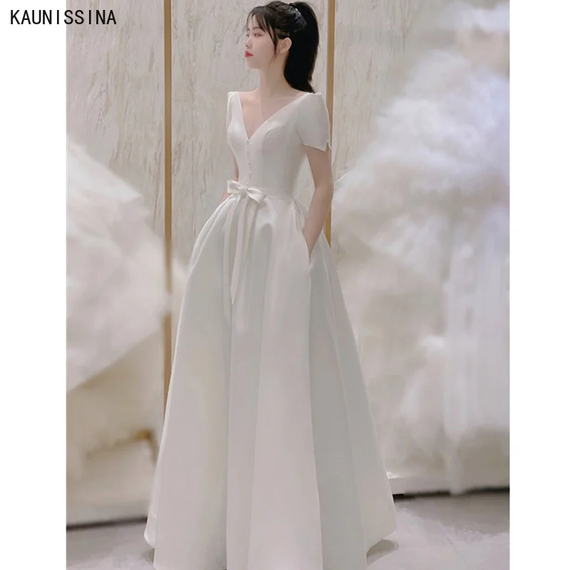 Фото Свадебное платье с коротким рукавом на пуговицах V-образным вырезом | Свадьбы и