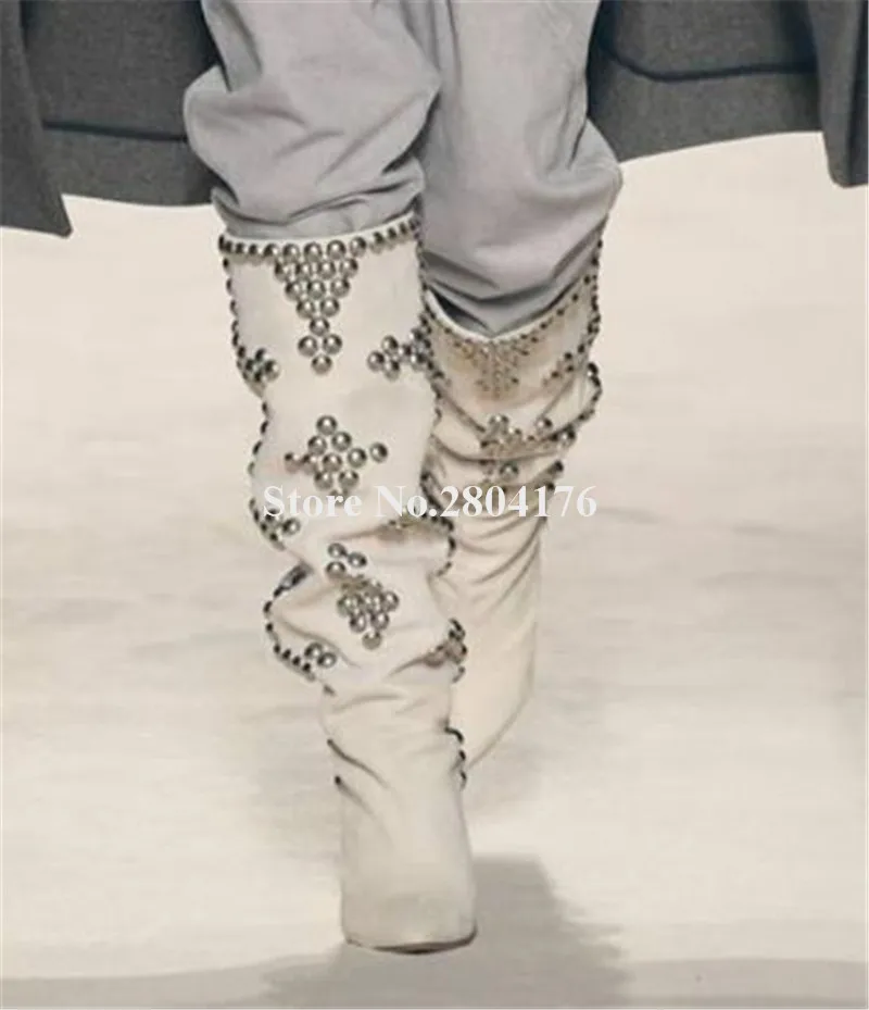 Сапоги выше колена с заостренным носком на каблуке-шпильке