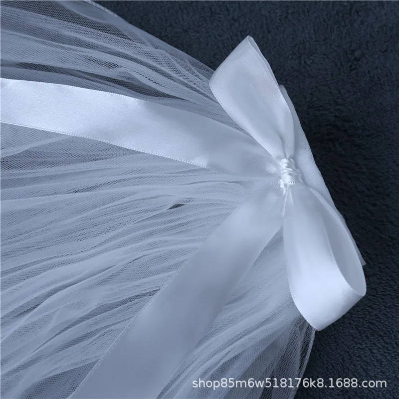 Белый бант двухслойная маленькая вуаль с боковым гребнем для волос фото тиара