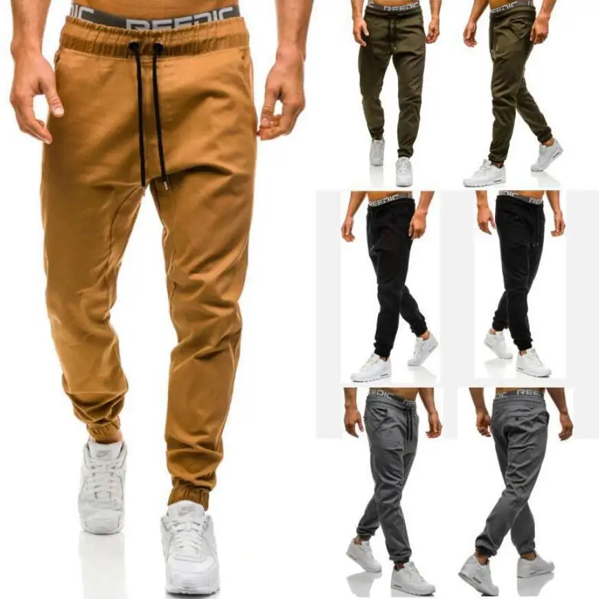 

2020 new men's casual tethered elastic sports baggy pants open crotch pants pants