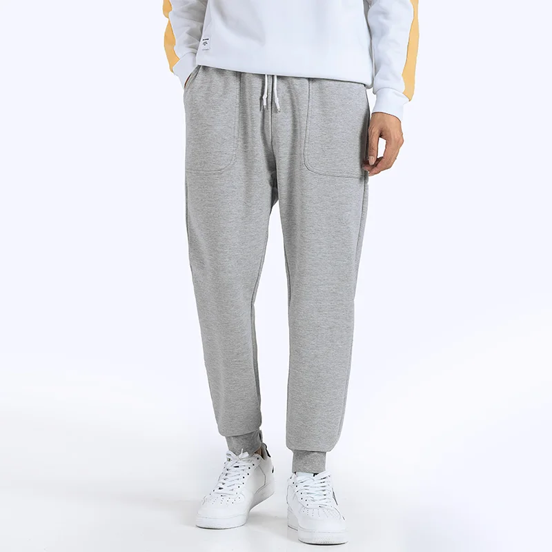 

Quality Brand Men's Trendy Wild Trousers High Street Fashion Elasticity Casual Pants Male Autumn New Men Solid Sweatpants