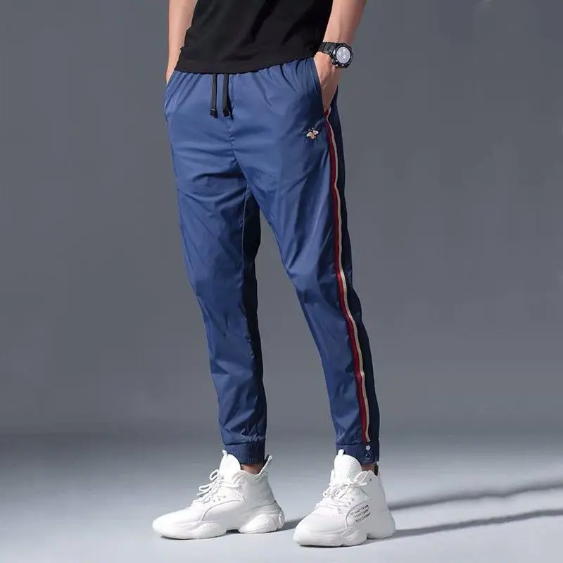

2021 new spring and autumn fashion pants men's loose Joker trend handsome young men's casual pants sports pants
