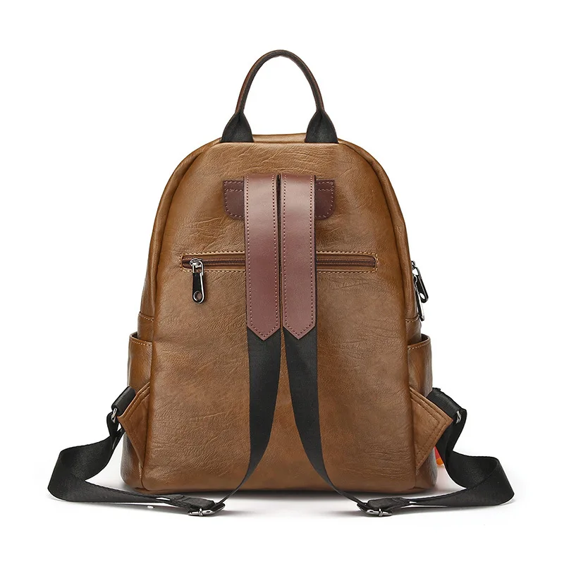 Винтажный женский кожаный рюкзак с заклепками защитой от кражи дорожный