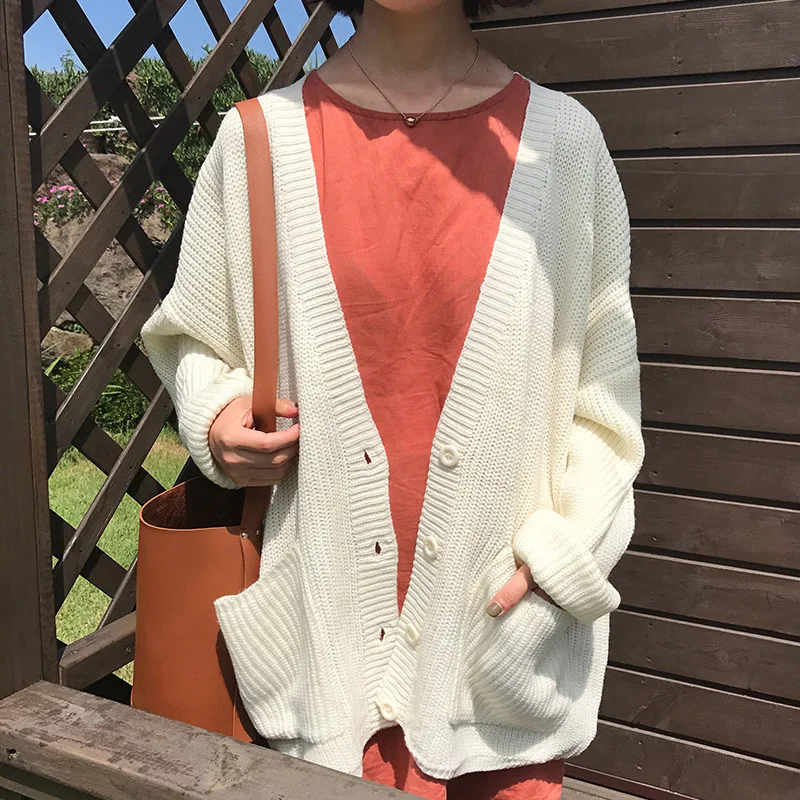 Женский вязаный свитер с длинным рукавом однотонный однобортный свободного кроя