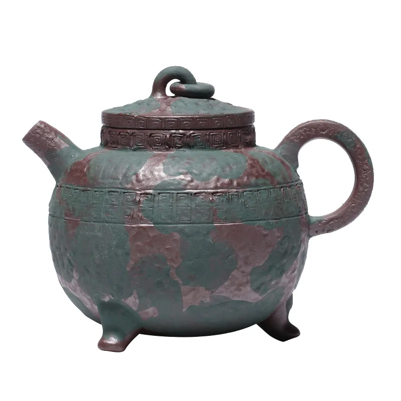 

Yixing purple clay teapot, a famous hand-made raw ore green mud purple mud tripod teapot