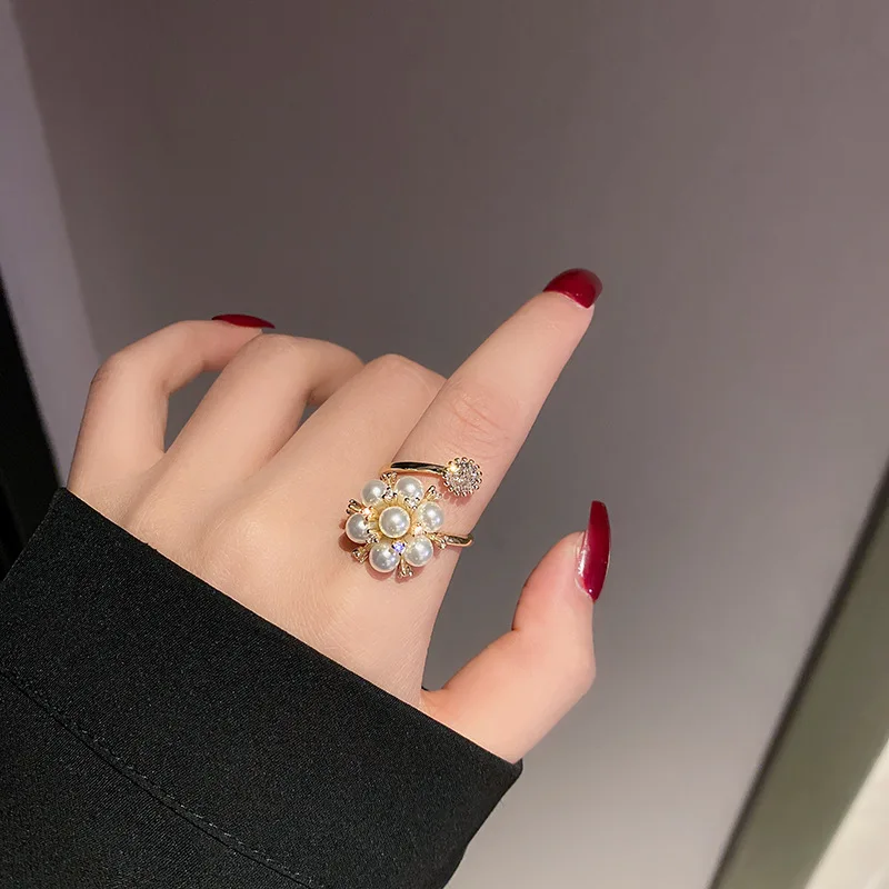 

Korean fashion personality diamond pearl flower open ring female temperament exquisite jewelry