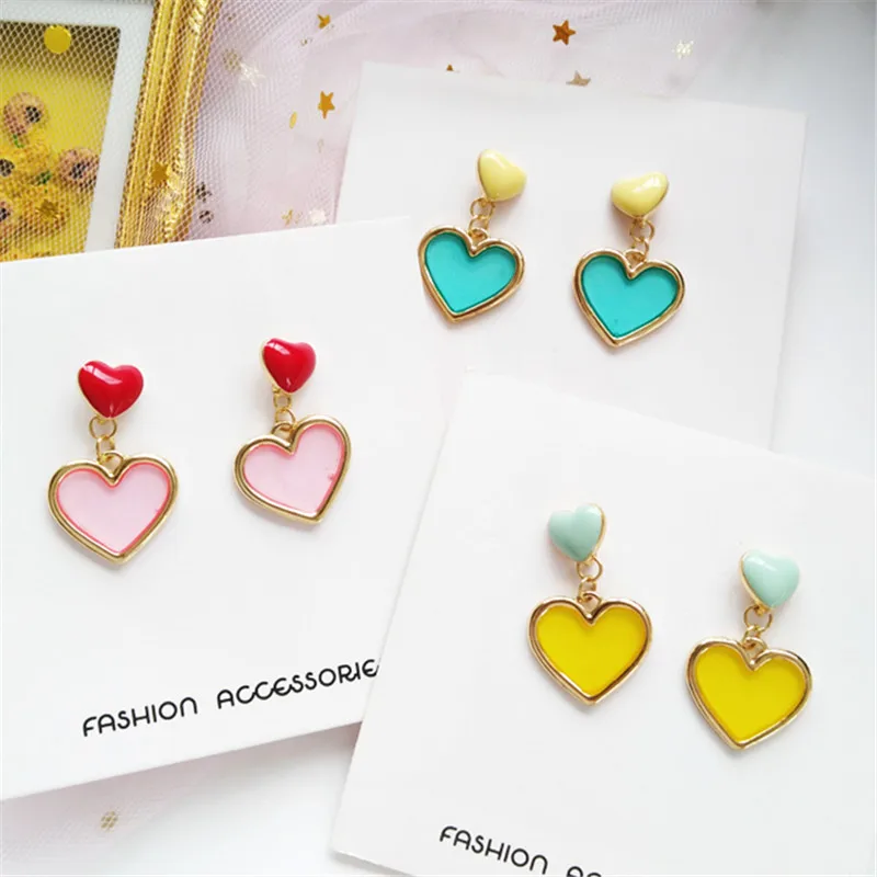 

Cute Romantic Colored heart-shaped earrings female Fashion red heart stud earrings simple transparent earrings for women