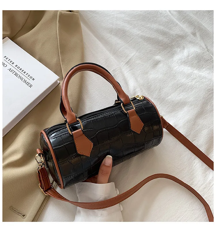 

Cylindrical bag retro design sense small bag female new trendy Japanese and Korean fashion hit color one-shoulder messenger bag