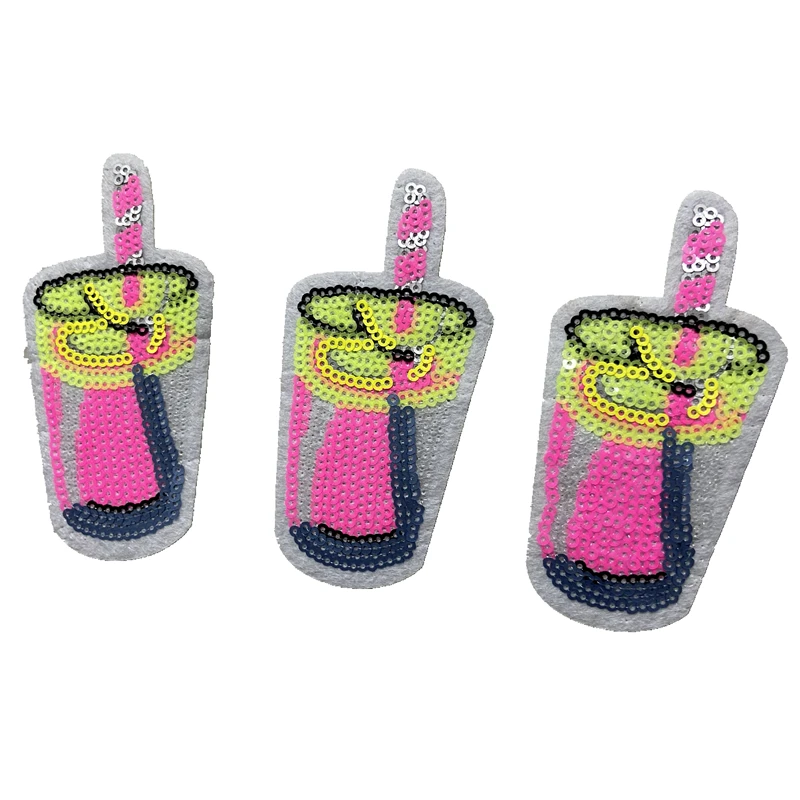 

Cup of juice drinking yellow and pink sequined jeans patch DIY
