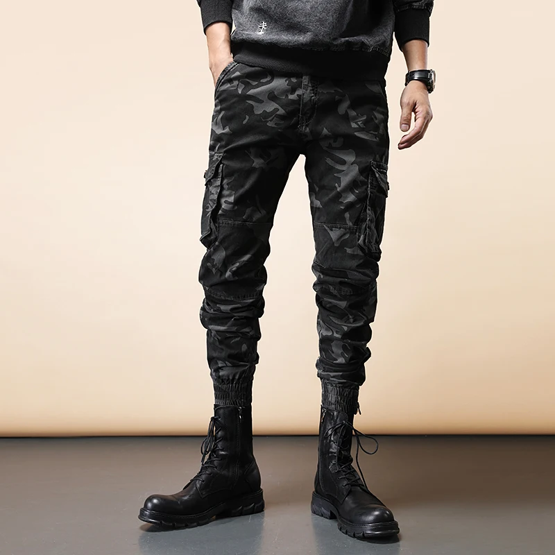 

Newly Designer Fashion Men Jeans Military Camouflage Multi Pockets Casual Cargo Pants Overall Streetwear Hip Hop Jogger Trousers