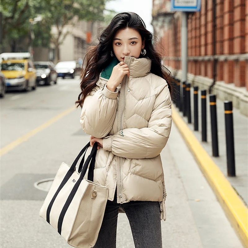 

Ashley Elegant warm short winter coat women Fashion design with pocket parka coat Stand collar Casual sash belt overcoat 2020