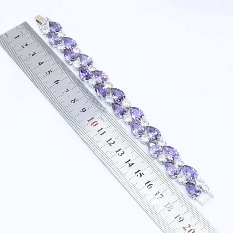 Искусственный роскошный браслет серебряного цвета с фиолетовым цирконом