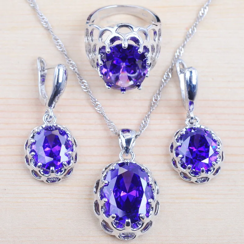 

Женский ювелирный комплект из кольца и серёг, серебристого цвета