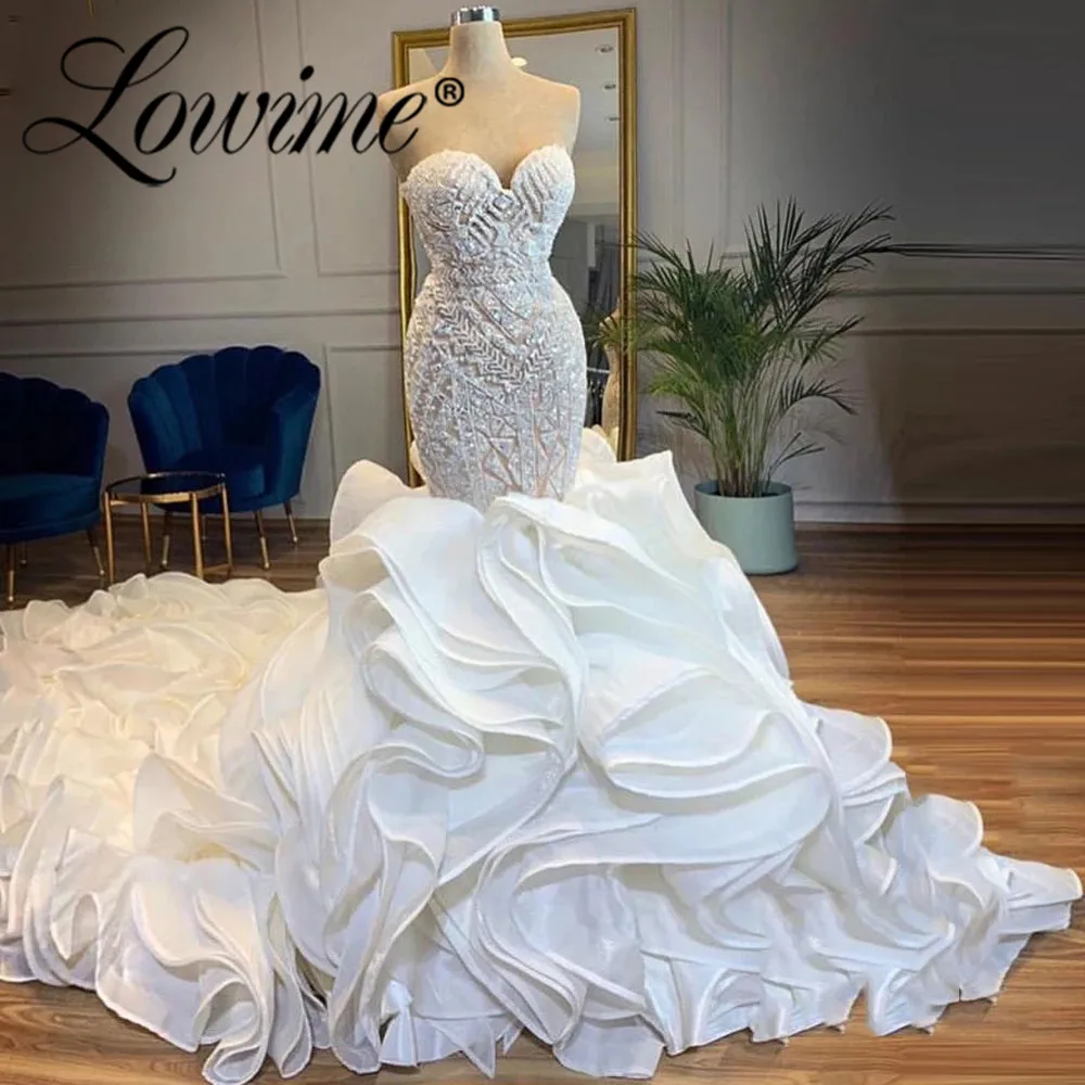 mermaid wedding dress with poofy bottom
