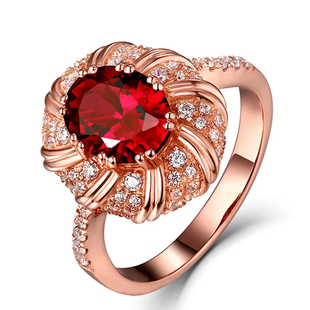 Кольцо женское под розовое золото с рубинами и красными кристаллами sizes678910 |