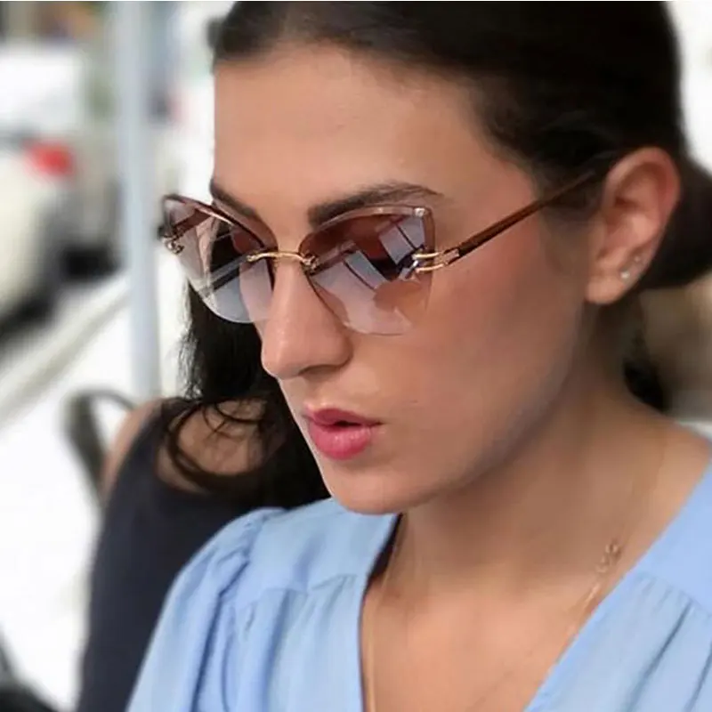 Без оправы Дизайн Для женщин Солнцезащитные кошачий глаз винтажные очки для