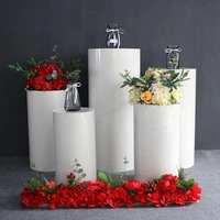 white wrought iron art round cylinder pedestal for birthday party dessert table display holiday wedding backdrop decorations
