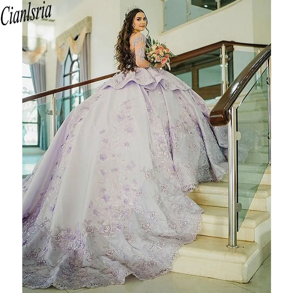 

Lavender Long Sleeve Ruffles Tiered Ball Gown Quinceanera Dress Handmade Flowers Appliques Sweet 16 Dress Vestidos De 15 Años