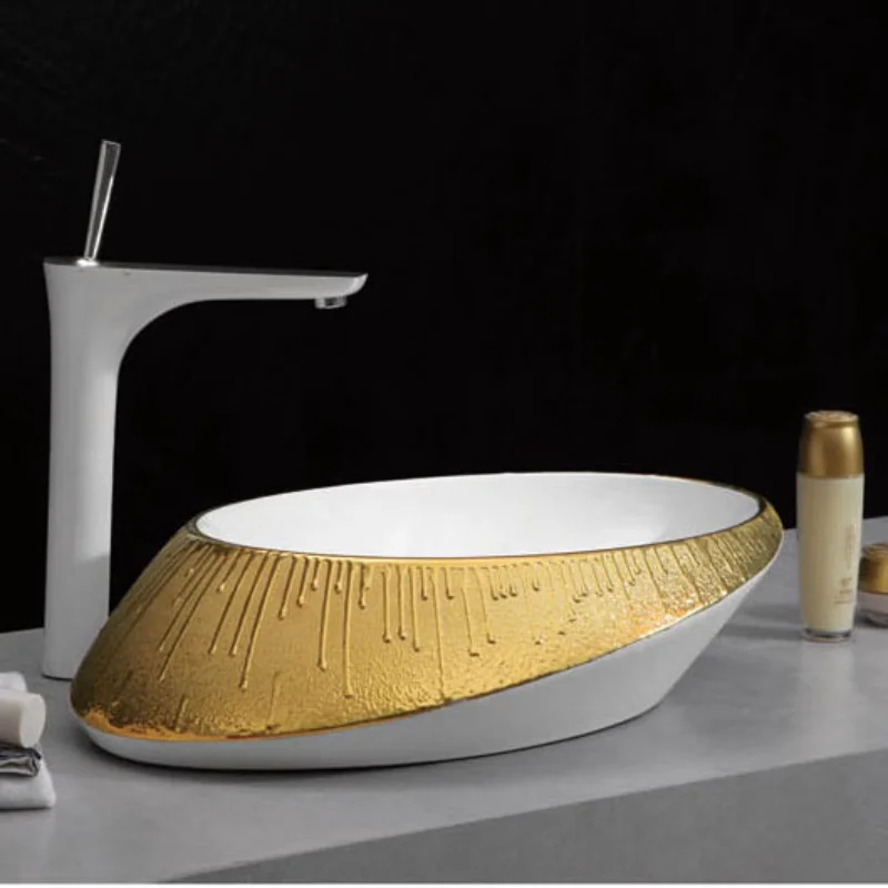 

Popular prodiuct hotel modern oval counter top bathroom wash hand sink ceramic golden art basin