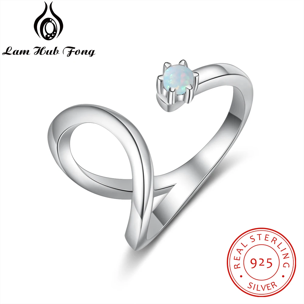 Женское кольцо из серебра 925 пробы с опалом открытое регулируемое геометрической