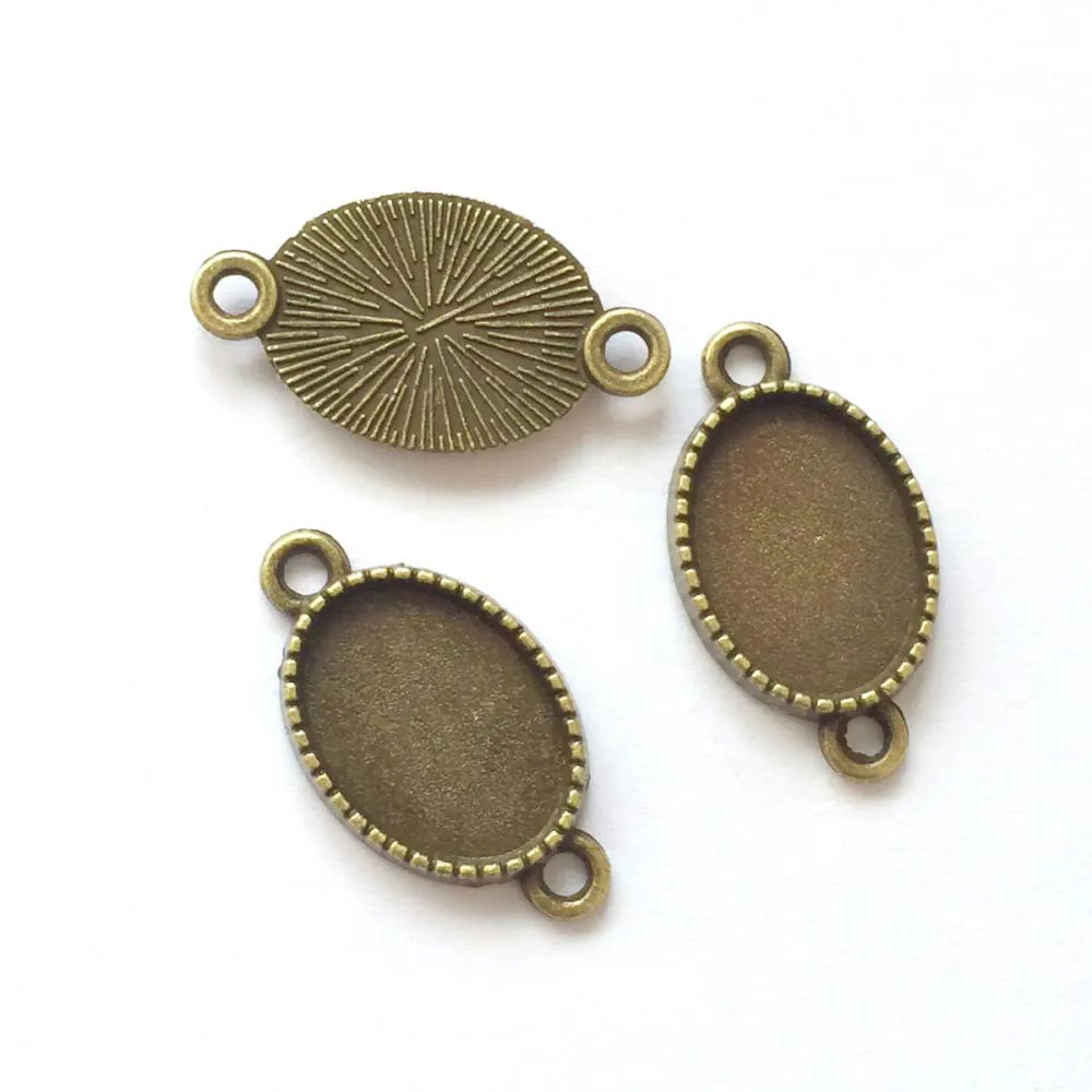 

20pcs/lot 10x14mm Necklace Pendant Setting Antique Bronze Glass Cabochon Blank Base Supplies for Jewelry T418