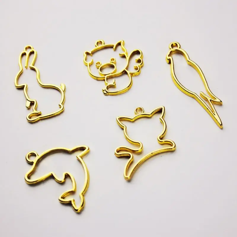 

10 Pcs UV Crystal Epoxy Border Metal Frame Bird Dolphin Cat Pig Animal Shape Hollow Modeling Crafts DIY Accessories