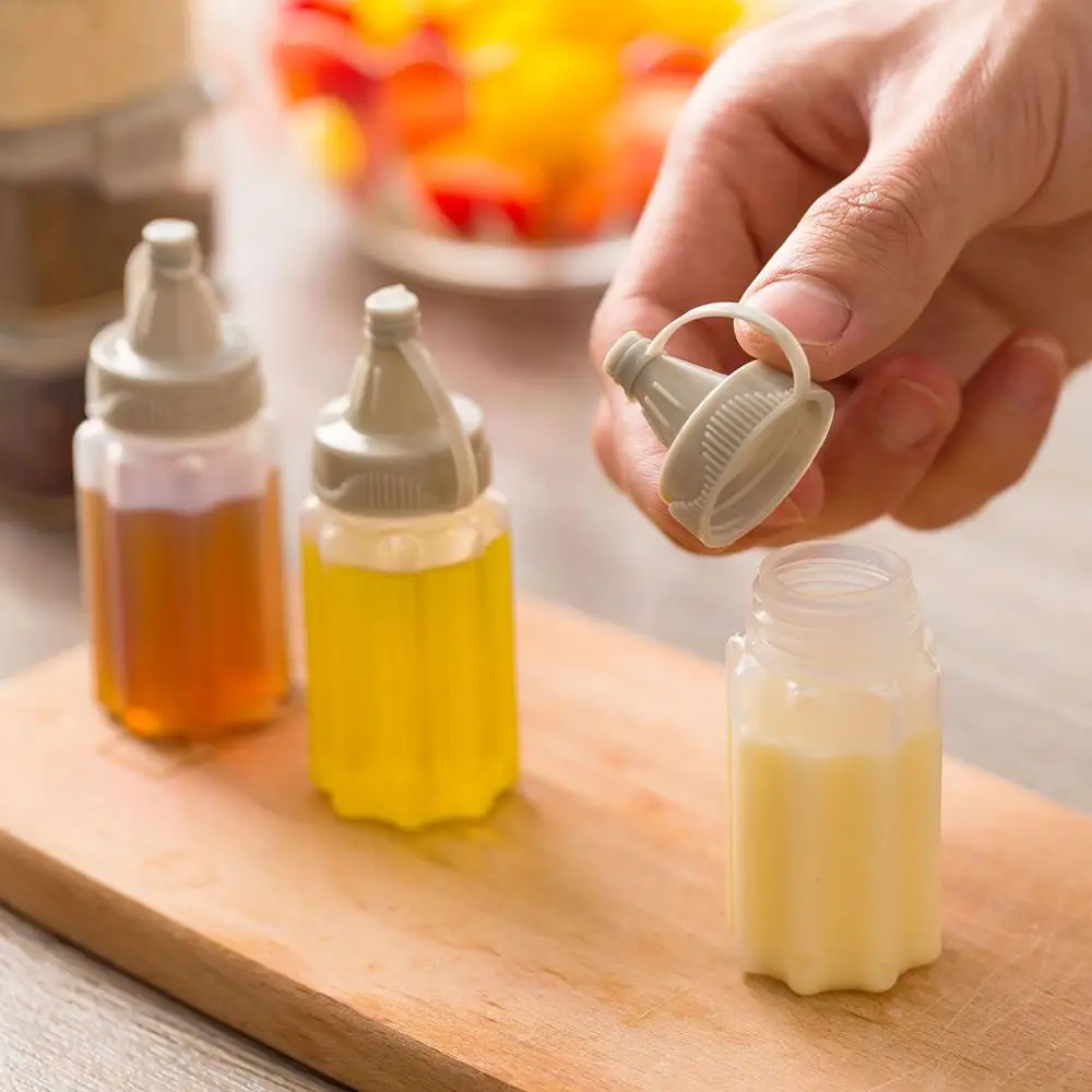 

4PCS/Set Mini Portable Seasoning Box Jam Squeeze Bottle Suit Barbecue Seasoning Sauce Bottle Kitchen Transparent Spice Jar