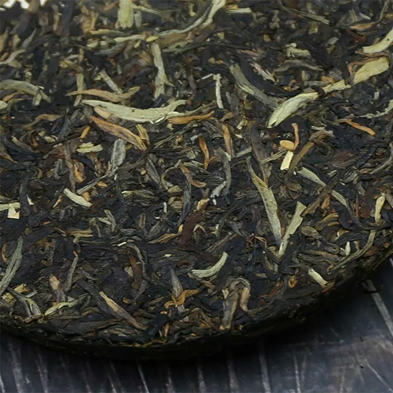 Xiaguan 2013 Sheng Pu-erh Song He Qizi Железный торт сырой чай Пуэр Специальный класс 357 г
